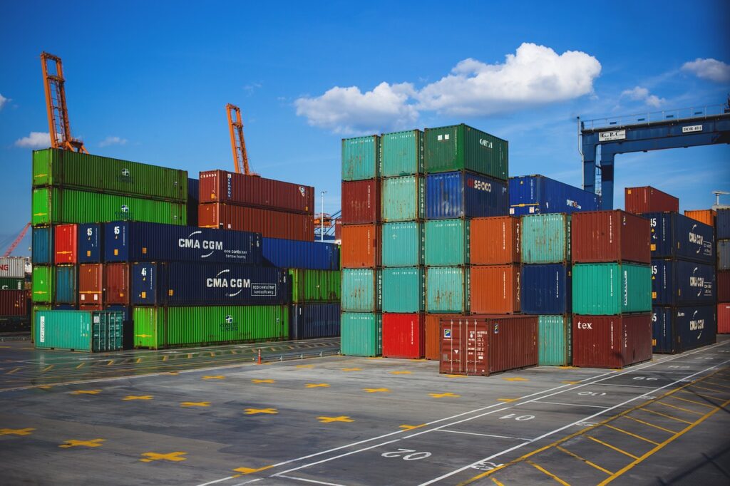 Shipping containers on a dock, symbolizing renting a Conex Box.