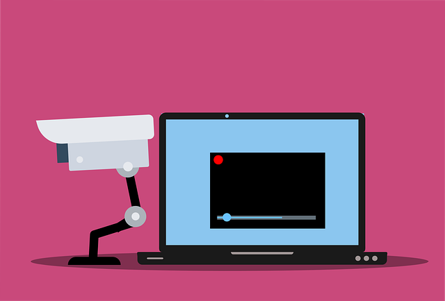 An illustration of a camera and a video recording on a laptop.