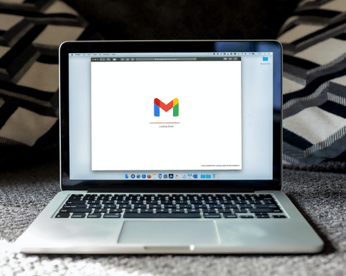 A laptop with the Gmail logo displayed with can help with CRM for small businesses