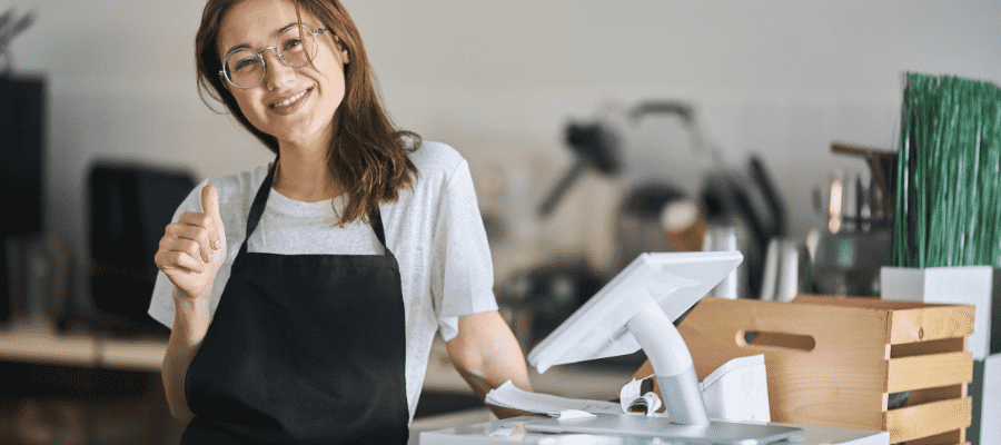 Woman using a restaurant POS system